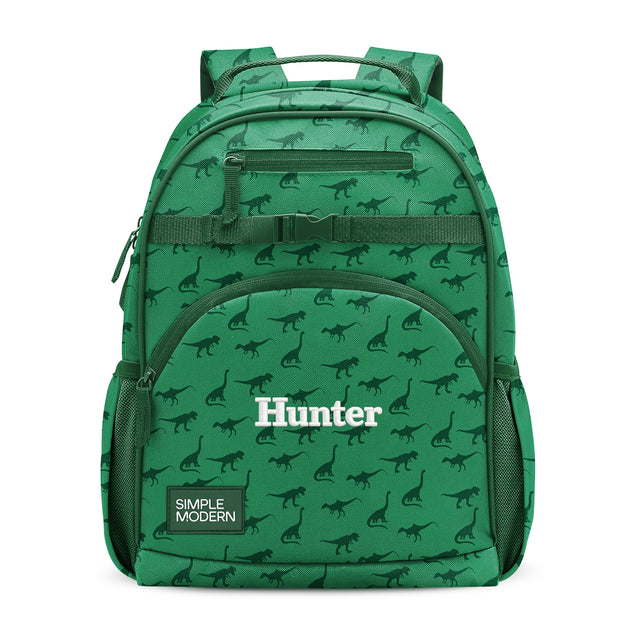 Green children's backpack with dinosaur pattern, padded shoulder straps, front zippered pockets, side mesh pockets, and Green children's backpack with dinosaur pattern, padded shoulder straps, front zippered pockets, side mesh pockets, and