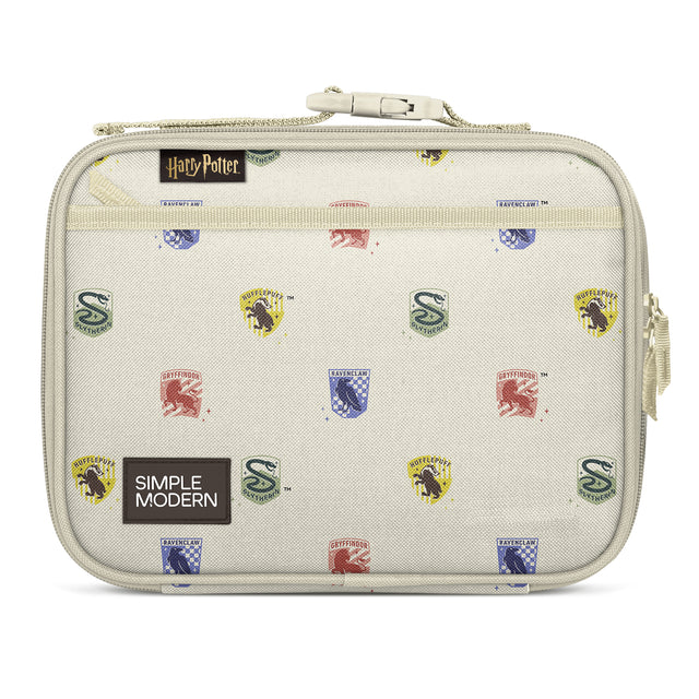 Cream insulated lunch box with repeating Hogwarts house crests (Gryffindor, Hufflepuff, Ravenclaw, Slytherin) in red, yellow, blue, and green. Features top zip closure, carry handle, and navy trim. Simple Modern branded. Cream insulated lunch box with repeating Hogwarts house crests (Gryffindor, Hufflepuff, Ravenclaw, Slytherin) in red, yellow, blue, and green. Features top zip closure, carry handle, and navy trim. Simple Modern branded.