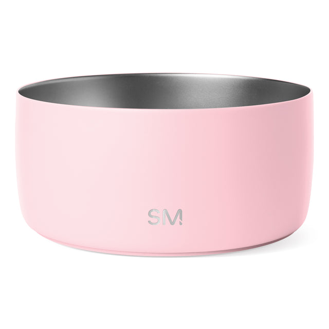 Stainless steel insulated bowl with soft pink exterior and brushed silver-gray interior. Cylindrical shape with wide rim and SM logo. White background. Stainless steel insulated bowl with soft pink exterior and brushed silver-gray interior. Cylindrical shape with wide rim and SM logo. White background.
