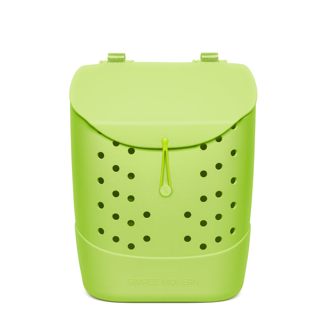 Lime green Simple Modern backpack with rounded silhouette, perforated black dots across front, woven handles, drawstring closure, and horizontal ridge detail on white background. Lime green Simple Modern backpack with rounded silhouette, perforated black dots across front, woven handles, drawstring closure, and horizontal ridge detail on white background.