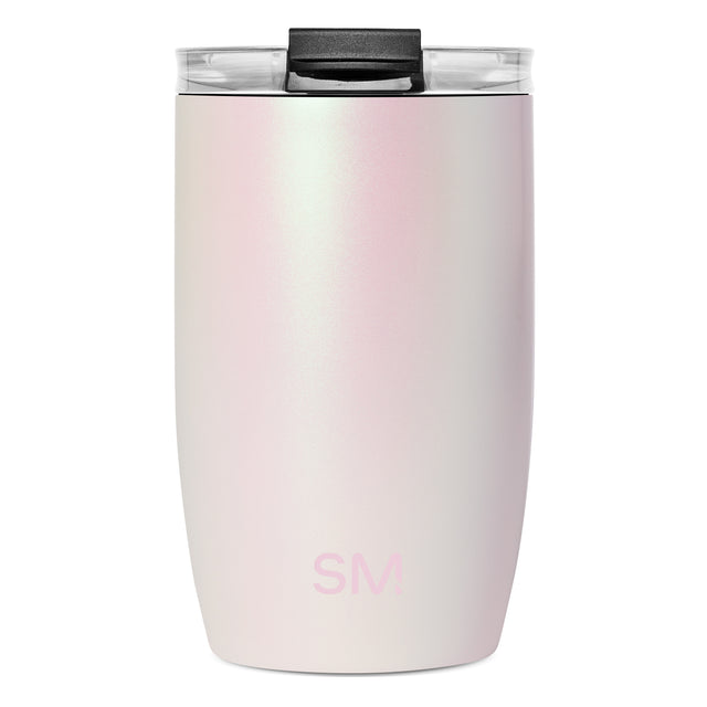 Pale pink Simple Modern 12-ounce insulated tumbler with matte black lid, clear tracking panels, and SM logo on white background. Pale pink Simple Modern 12-ounce insulated tumbler with matte black lid, clear tracking panels, and SM logo on white background.