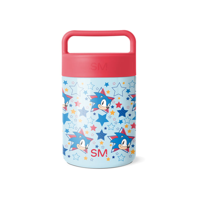 Simple Modern insulated food jar with coral pink lid and light blue body featuring animated blue character with spiky quills surrounded by colorful stars in a repeating pattern. Includes carrying handle. Simple Modern insulated food jar with coral pink lid and light blue body featuring animated blue character with spiky quills surrounded by colorful stars in a repeating pattern. Includes carrying handle.