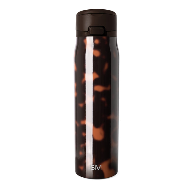 Tortoiseshell patterned 30-ounce insulated water bottle with brown, black, amber and orange tones, white vertical stripe down center, matte black cap, and Simple Modern logo on white background. Tortoiseshell patterned 30-ounce insulated water bottle with brown, black, amber and orange tones, white vertical stripe down center, matte black cap, and Simple Modern logo on white background.