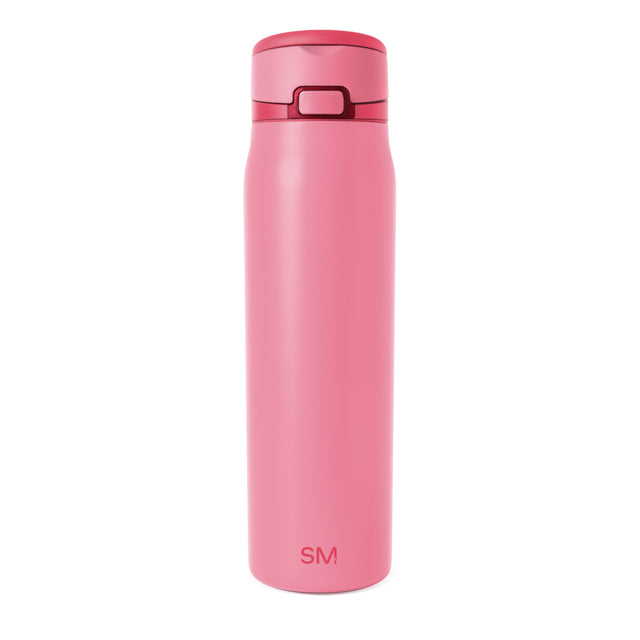 Dusty pink cylindrical beverage container with a mauve-toned rectangular handle and rim on the lid. Dusty pink cylindrical beverage container with a mauve-toned rectangular handle and rim on the lid.