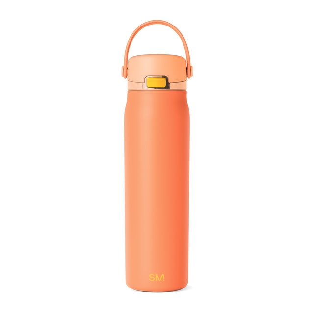 Coral orange water bottle with matching lid and carrying handle on white background Coral orange water bottle with matching lid and carrying handle on white background