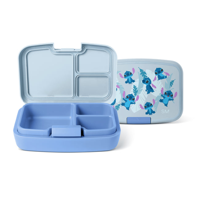 Double compartment lunchbox by Simple Modern in periwinkle blue with three food storage sections, shown open and closed with decorative character lid against white background. Double compartment lunchbox by Simple Modern in periwinkle blue with three food storage sections, shown open and closed with decorative character lid against white background.