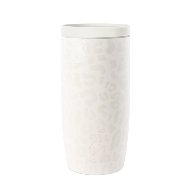 White cylindrical beverage tumbler with subtle embossed leopard print texture pattern White cylindrical beverage tumbler with subtle embossed leopard print texture pattern