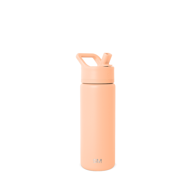 Peachy-pink salmon-colored product on neutral off-white background Peachy-pink salmon-colored product on neutral off-white background