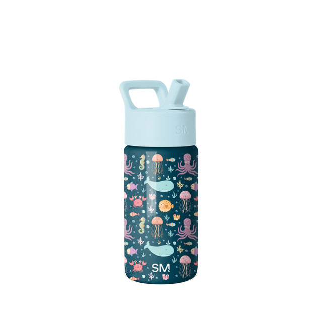 Simple Modern insulated water bottle with pale blue cap and dark teal body featuring colorful underwater creatures including octopuses, jellyfish, whales, fish, and coral in pink, yellow, and cyan tones. Simple Modern insulated water bottle with pale blue cap and dark teal body featuring colorful underwater creatures including octopuses, jellyfish, whales, fish, and coral in pink, yellow, and cyan tones.