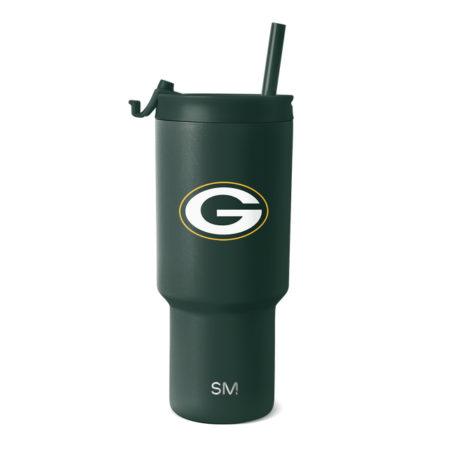 Forest green matte finish tumbler with matching lid, cylindrical design with white accents Forest green matte finish tumbler with matching lid, cylindrical design with white accents
