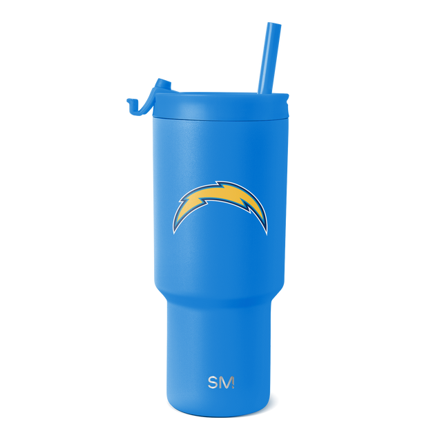 Bright blue tumbler with golden yellow accents Bright blue tumbler with golden yellow accents