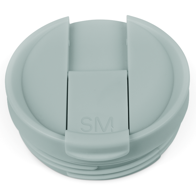 Sage green flip lid container with soft muted finish on white background Sage green flip lid container with soft muted finish on white background