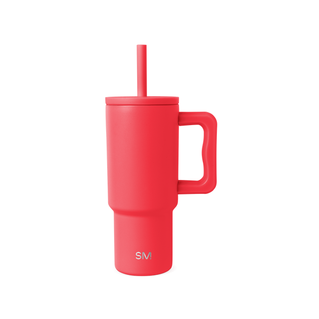 Coral-red insulated tumbler with handle and matching straw on white background. Features SM logo on front. Modern, cylindrical design with ergonomic grip. Product photography. Coral-red insulated tumbler with handle and matching straw on white background. Features SM logo on front. Modern, cylindrical design with ergonomic grip. Product photography.