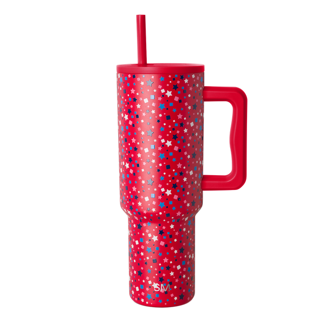 Red tumbler with scattered white geometric shapes and stars pattern Red tumbler with scattered white geometric shapes and stars pattern