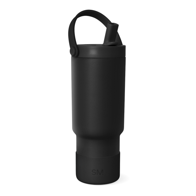 Black thermal tumbler with matte and glossy finishes, featuring a sleek cylindrical design with textured grip sections and a secure lid closure mechanism. Black thermal tumbler with matte and glossy finishes, featuring a sleek cylindrical design with textured grip sections and a secure lid closure mechanism.