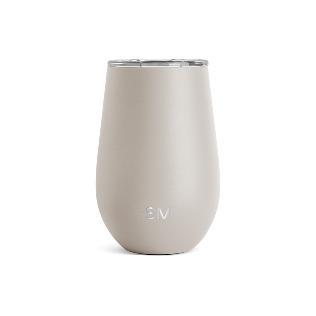 Cream-colored insulated tumbler with stainless steel lid on white background. Tapered cylindrical shape with curved sides widening toward middle. Cream-colored insulated tumbler with stainless steel lid on white background. Tapered cylindrical shape with curved sides widening toward middle.