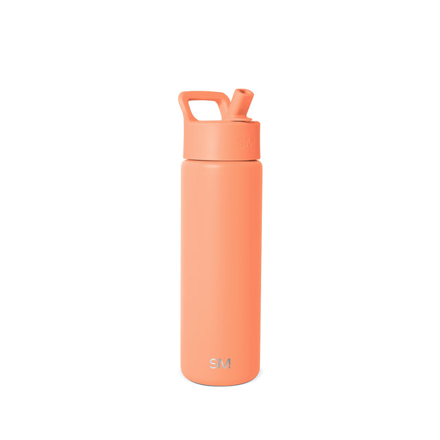Coral-salmon pink Simple Modern insulated water bottle with square handle and flip-top spout, shown against neutral background. SM logo visible on lower front. Coral-salmon pink Simple Modern insulated water bottle with square handle and flip-top spout, shown against neutral background. SM logo visible on lower front.