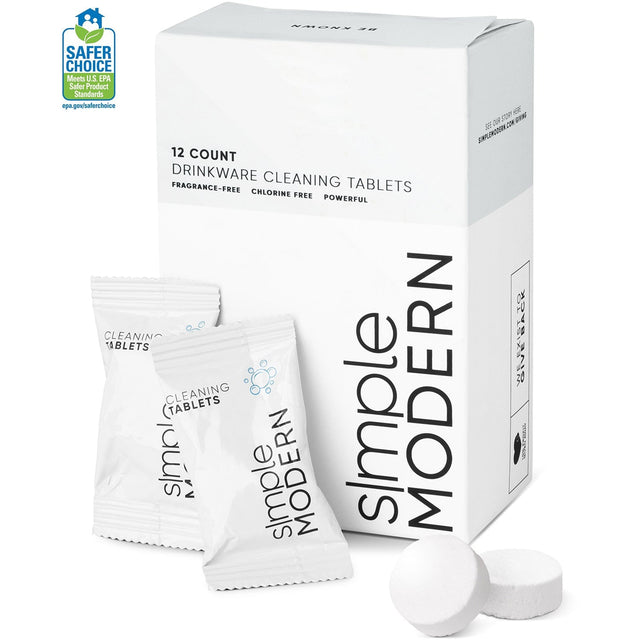White cleaning tablets in transparent pouches next to white packaging box with black text, displayed against white background with gray shadows White cleaning tablets in transparent pouches next to white packaging box with black text, displayed against white background with gray shadows
