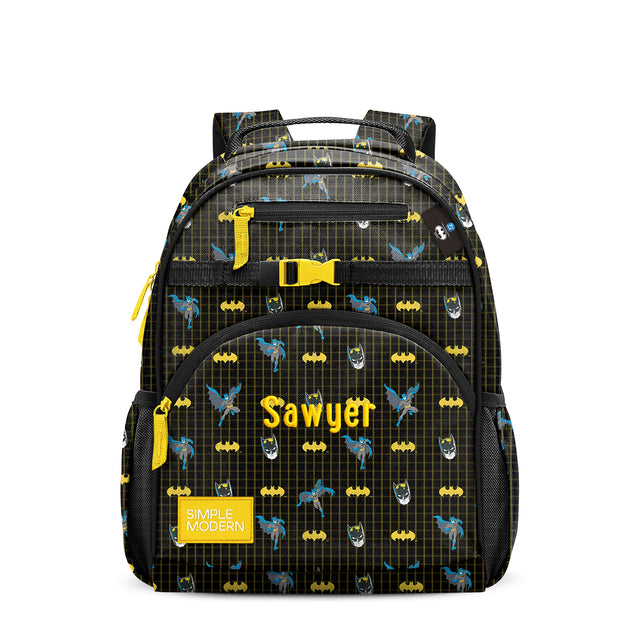 Black children's backpack with yellow and blue accents, front zippered pockets, yellow chest strap buckle, padded shoulder straps, and 