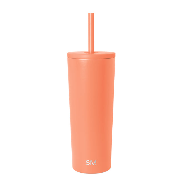 Coral insulated tumbler with matching lid and straw on white background. Simple Modern brand logo visible on tumbler body. Modern minimalist product photography.