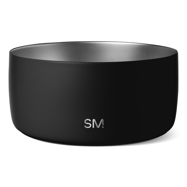 Black matte cylindrical vessel with silver gunmetal gray rim opening, photographed against light gray background