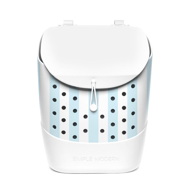 White insulated bucket backpack by Simple Modern with powder blue and white striped interior, black ventilation dots, drawstring closure, and white handles against white background.