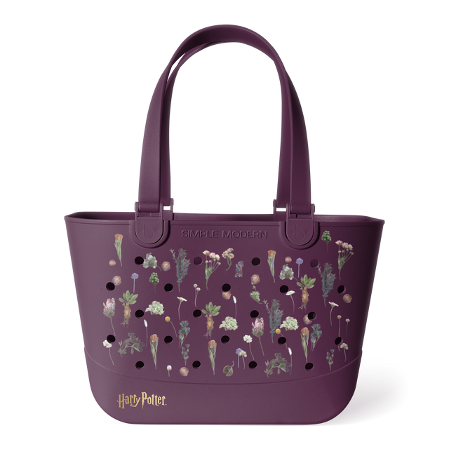 Plum purple Simple Modern Harry Potter tote bag with dual handles, featuring botanical wildflower illustrations and black perforations across the front, displayed on white background.
