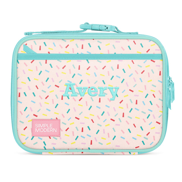 Personalized insulated lunch box for kids in soft pink and turquoise with colorful sprinkles, featuring 