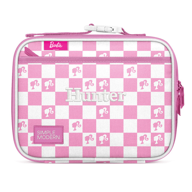 Pink and white checkerboard insulated lunch box with Barbie branding, quilted material, top zip closure, pink carrying handles, and 