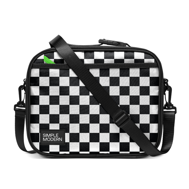 Black and white checkered crossbody bag with black trim, neon green accent tab, adjustable strap, and 