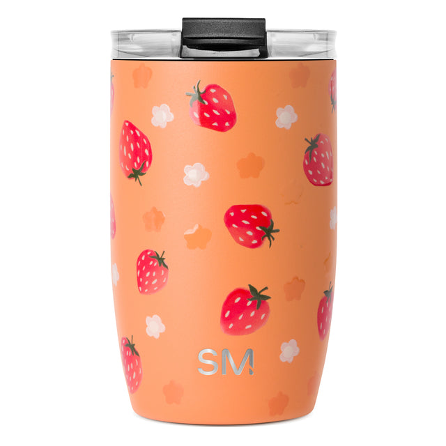 Peach coral tumbler with bright red strawberries and white seeds scattered across the surface, with white cloud accents.