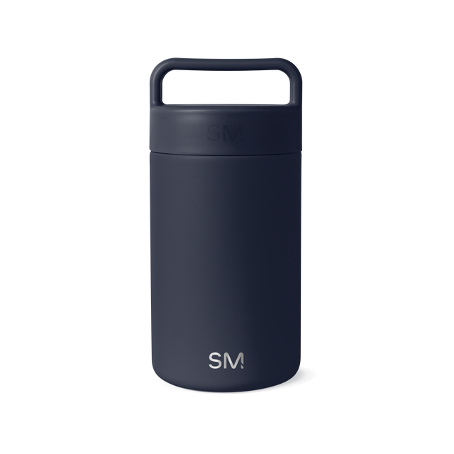 Deep navy blue jar with white SM logo branding and accents