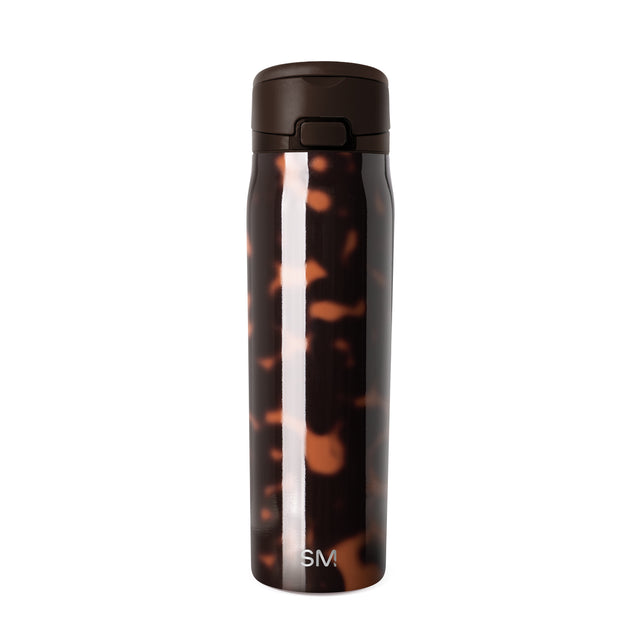 Tortoiseshell patterned insulated water bottle with dark brown and black tones, amber accents, white center stripe, and flip-top lid. Simple Modern 24 oz bottle on white background.