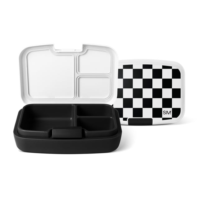 Three Simple Modern lunch containers with black and white compartmentalized bases and lids displayed against a white background. One features a checkered lid with the SM logo.