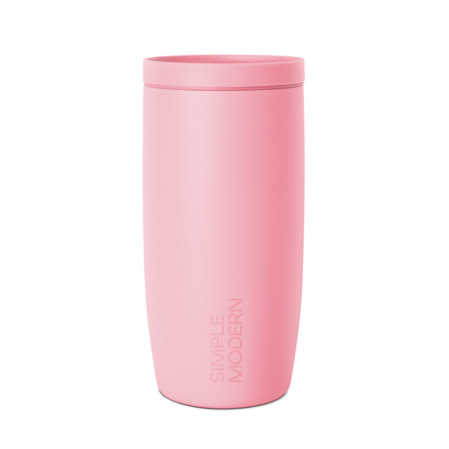 Rose pink cylindrical tumbler with matching lid by Simple Modern, displayed against white background with soft shadow detail.