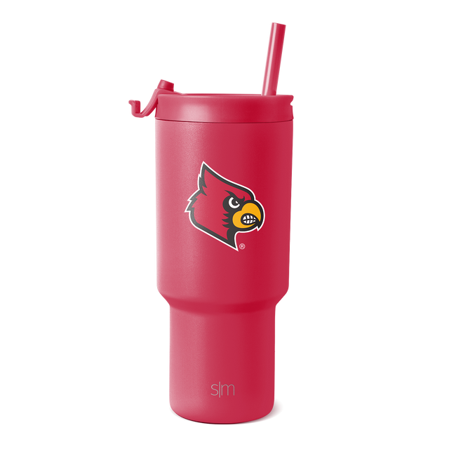Coral red insulated tumbler with stainless steel construction, shown against white background