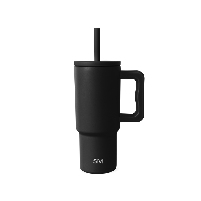 Matte black vessel against neutral off-white background