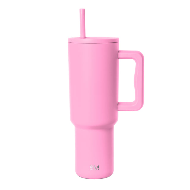 Bright medium pink insulated tumbler with white background