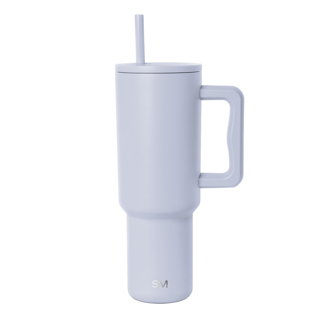 Periwinkle blue tumbler with matte finish on white background