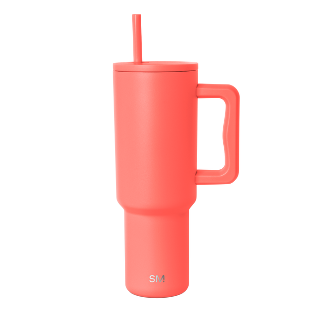 Coral-red tumbler with white background